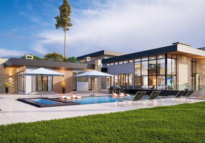 a modern house with a pool and lounge chairs